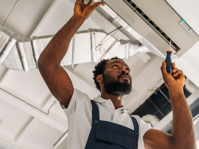 low angle view of african american handyman repair cbf4w7a 2 1 (1)